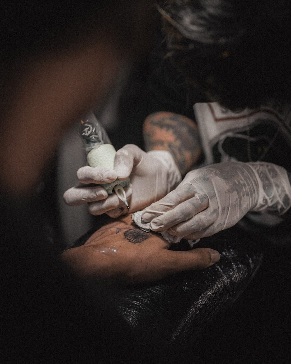 Exemple — Tatoueur·euse
